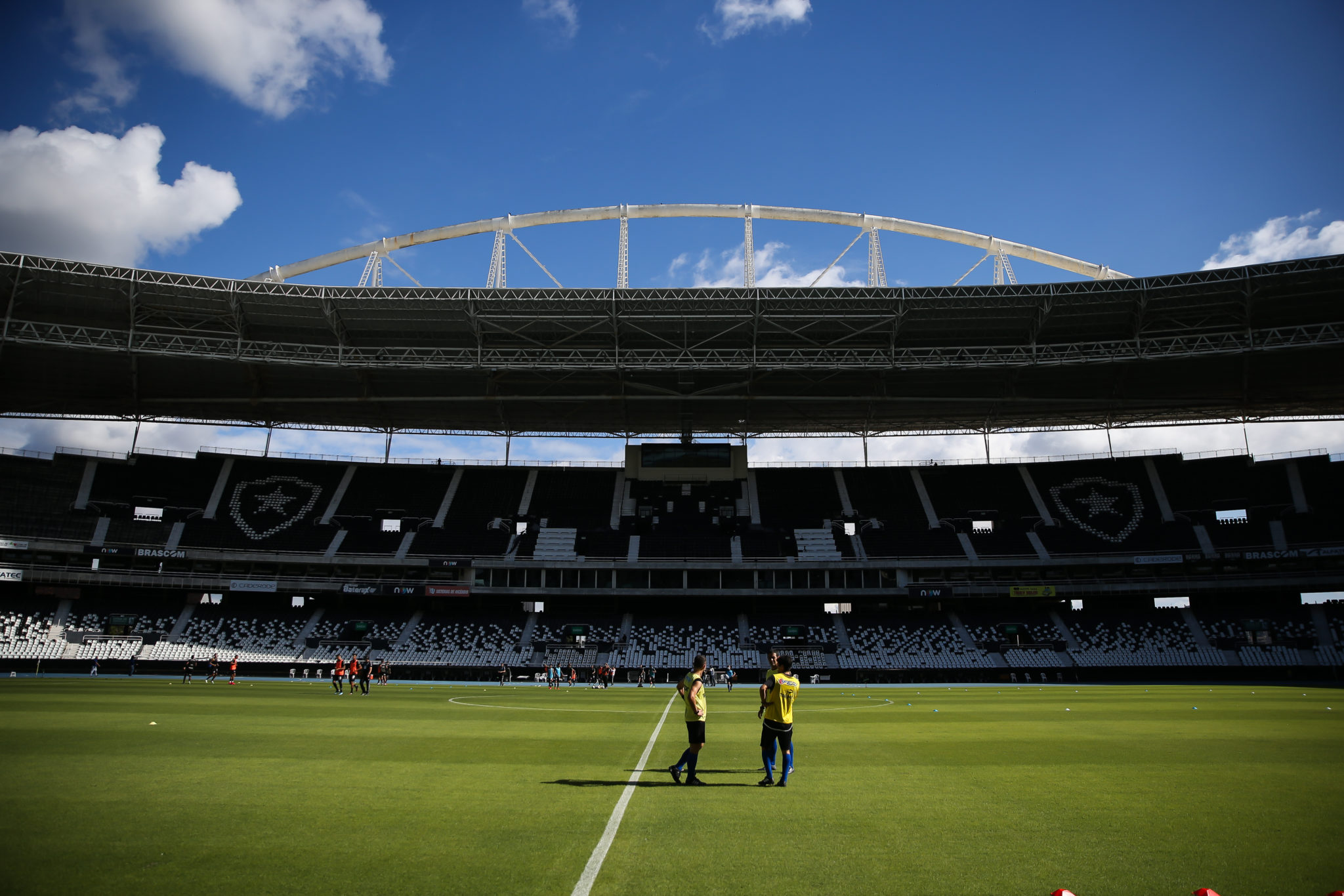 RIO DE JANEIRO, BRAZIL - JUNE 28: Referees warm up prior to the match between Botafogo and Cabofriense as part of the Carioca State Championship at Nilton Santos Stadium (aka Engenhao Stadium) on June 28, 2020 in Rio de Janeiro, Brazil. The match is played behind closed doors and further precautionary measures against the coronavirus (COVID - 19) Pandemic. (Photo by Buda Mendes/Getty Images)