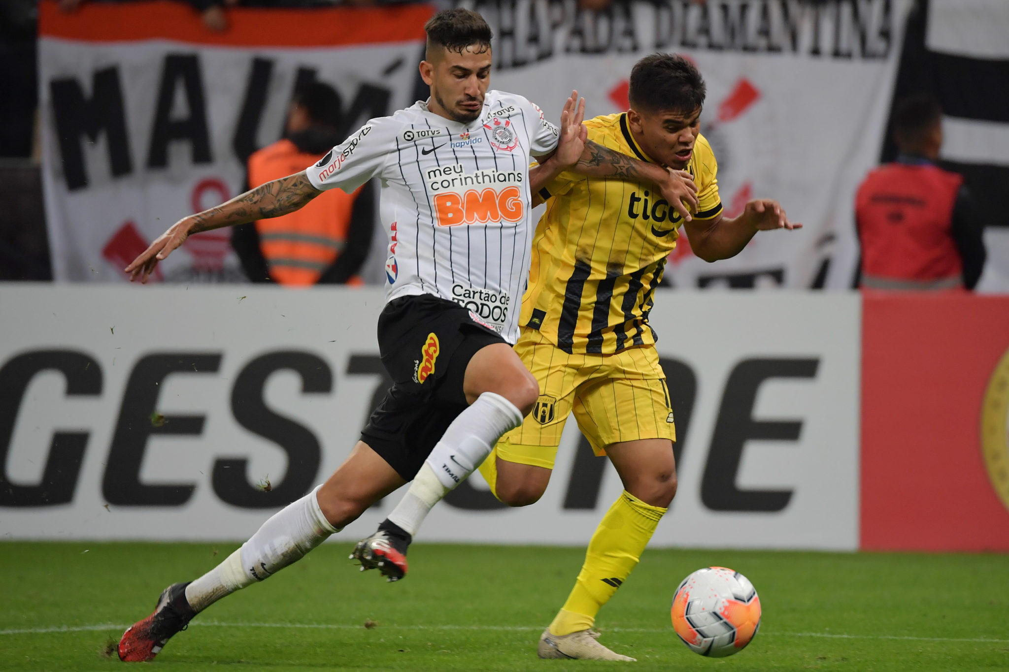 Pedro Henrique (L) of Brazil's Corinthians, vies for the ball with Rodney Redes (R) of Paraguay's Guarani, during their 2020 Copa Libertadores football match held at Arena Corinthians stadium, in Sao Paulo, Brazil, on February 12, 2020. (Photo by NELSON ALMEIDA / AFP) (Photo by NELSON ALMEIDA/AFP via Getty Images)