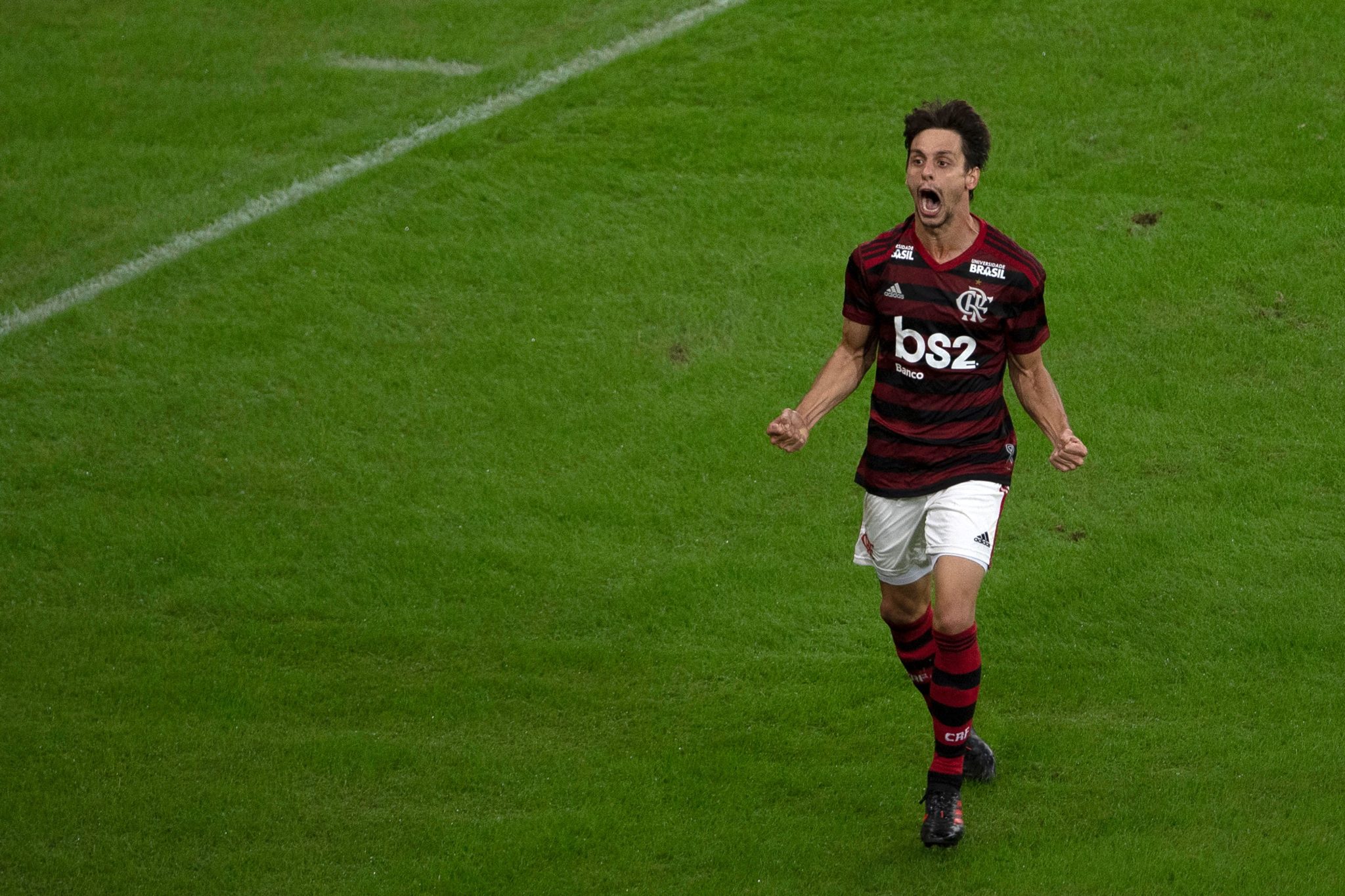 Brazil's Flamengo Rodrigo Caio celebrates with his teammates his goal that gave the victory to Flamengo during Copa do Brasil 2019 football match between Brazil's Flamengo and Brazil's Corinthians at Maracana stadium in Rio de Janeiro, Brazil, on June 4, 2019. (Photo by MAURO PIMENTEL / AFP)        (Photo credit should read MAURO PIMENTEL/AFP via Getty Images)