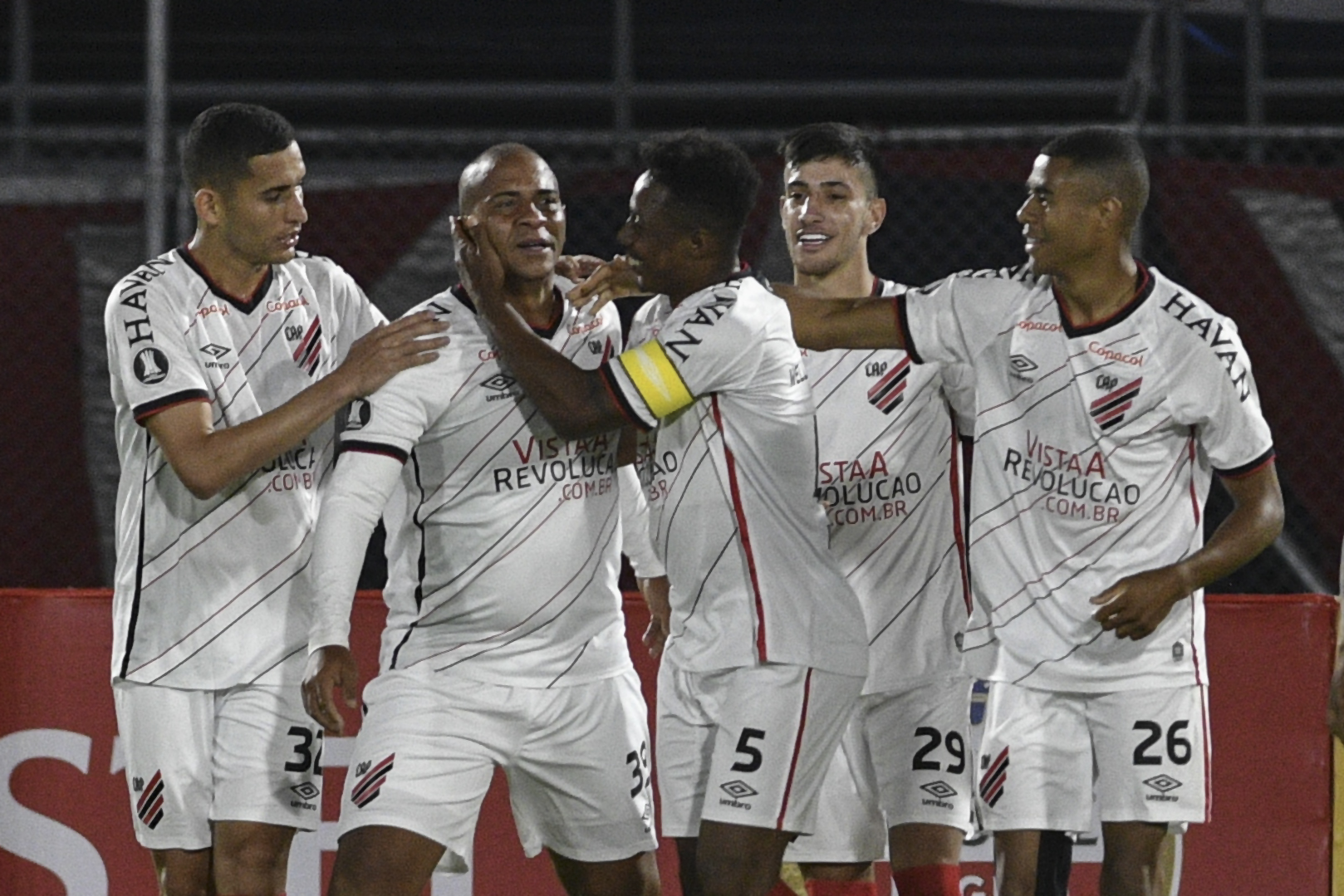 Brazil's Athletico Paranaense forward Walter (2nd L) celebrates with teammates after scoring against Bolivia's Jorge Wilstermann, during their closed-door Copa Libertadores group phase football match at the Felix Capriles stadium in Cochabamba, Bolivia, on September 15, 2020, amid the COVID-19 novel coronavirus pandemic. (Photo by AIZAR RALDES / AFP) (Photo by AIZAR RALDES/AFP via Getty Images)