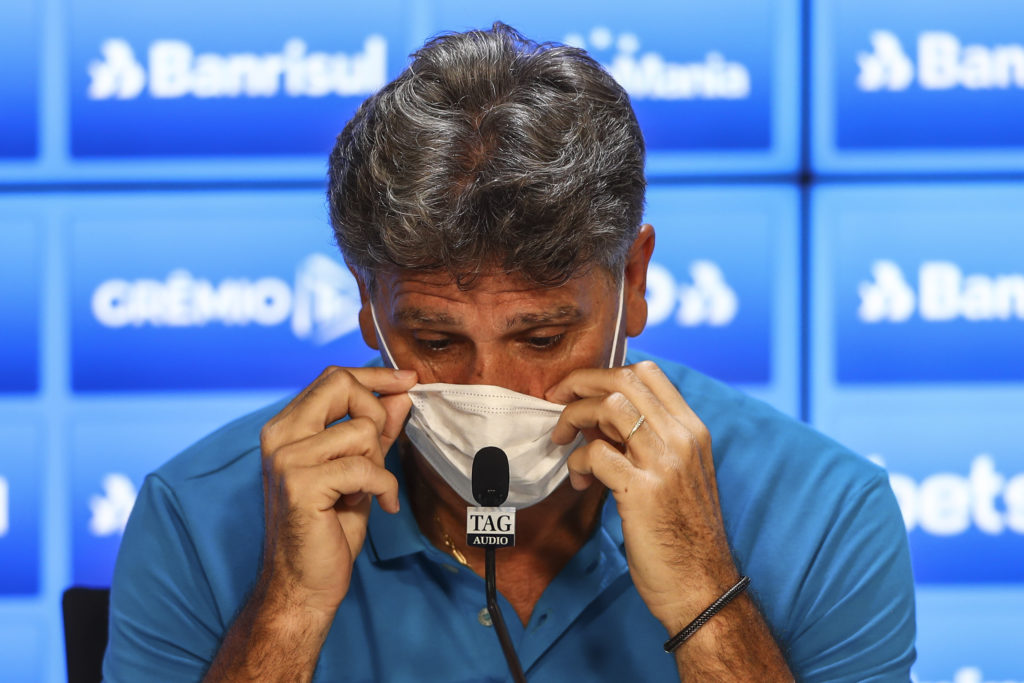 PORTO ALEGRE, BRAZIL - MARCH 15: Renato Portaluppi coach of Gremio during the press conference wearing masks after the match between Gremio and Sao Luiz as part of the Rio Grande do Sul State Championship 2020, to be played behind closed doors at Arena do Gremio Stadium, on March 15, 2020 in Porto Alegre, Brazil. The Government of the State of Rio Grande do Sul issued a list of new guidelines to help prevent the spread of the Coronavirus which included games played with closed doors and no public. According to the Ministry of Health, as of Saturday, March 14, Brazil had 121 confirmed cases of coronavirus. (Photo by Lucas Uebel/Getty Images)