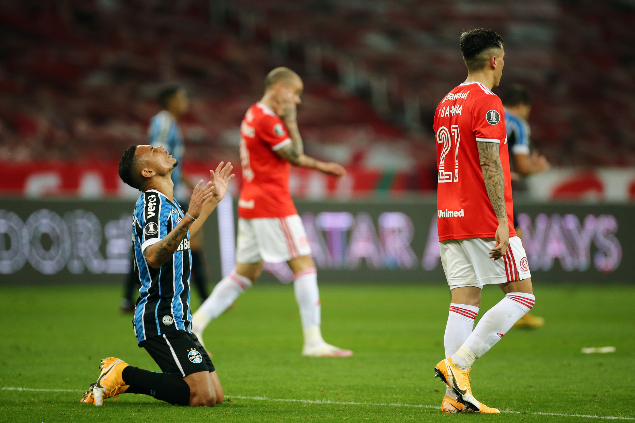 PORTO ALEGRE, BRAZIL - SEPTEMBER 23: Luiz Fernando of Gremio prays as he celebrates winning a group E match of Copa CONMEBOL Libertadores 2020 between Internacional and Gremio at Beira-Rio Stadium on September 23, 2020 in Porto Alegre, Brazil. All games of the tournament are played behind closed doors to avoid spread of COVID-19.  (Photo by Diego Vara-Pool/Getty Images)